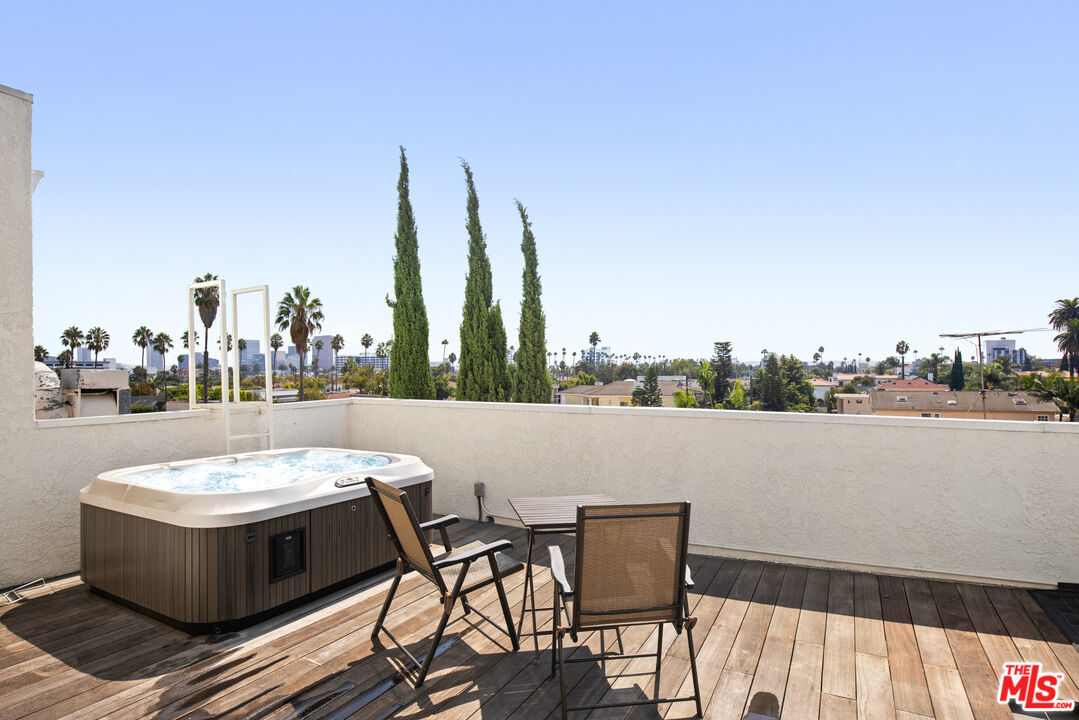 432 South Hamel Road, Unit 302 Los Angeles, CA 90048 - Photo 17 of 20 a view of lake from balcony with seating space