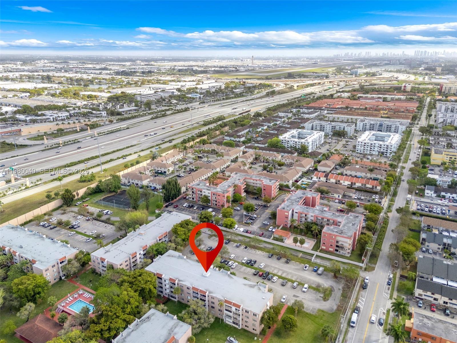 8405 Northwest 8th Street, Unit 1072 Miami, FL 33126 - Photo 12 of 33 an aerial view of residential building with ocean view