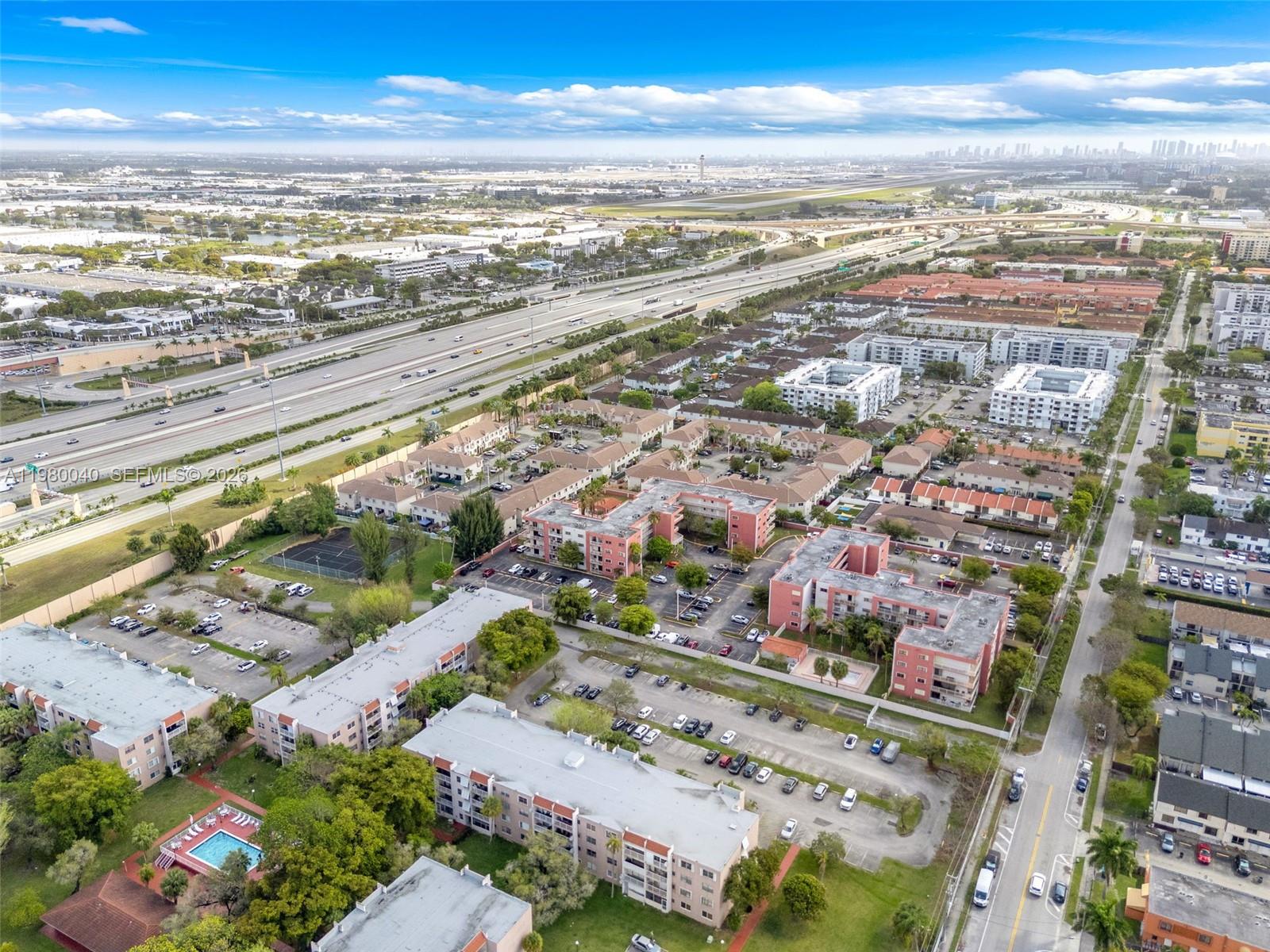 8405 Northwest 8th Street, Unit 1072 Miami, FL 33126 - Photo 13 of 33 an aerial view of residential building and ocean