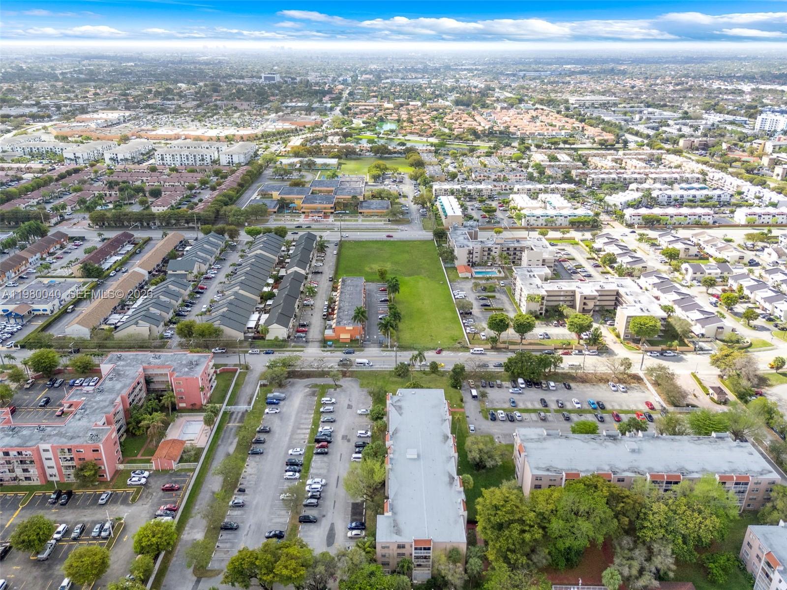 8405 Northwest 8th Street, Unit 1072 Miami, FL 33126 - Photo 6 of 33 an aerial view of residential houses with outdoor space