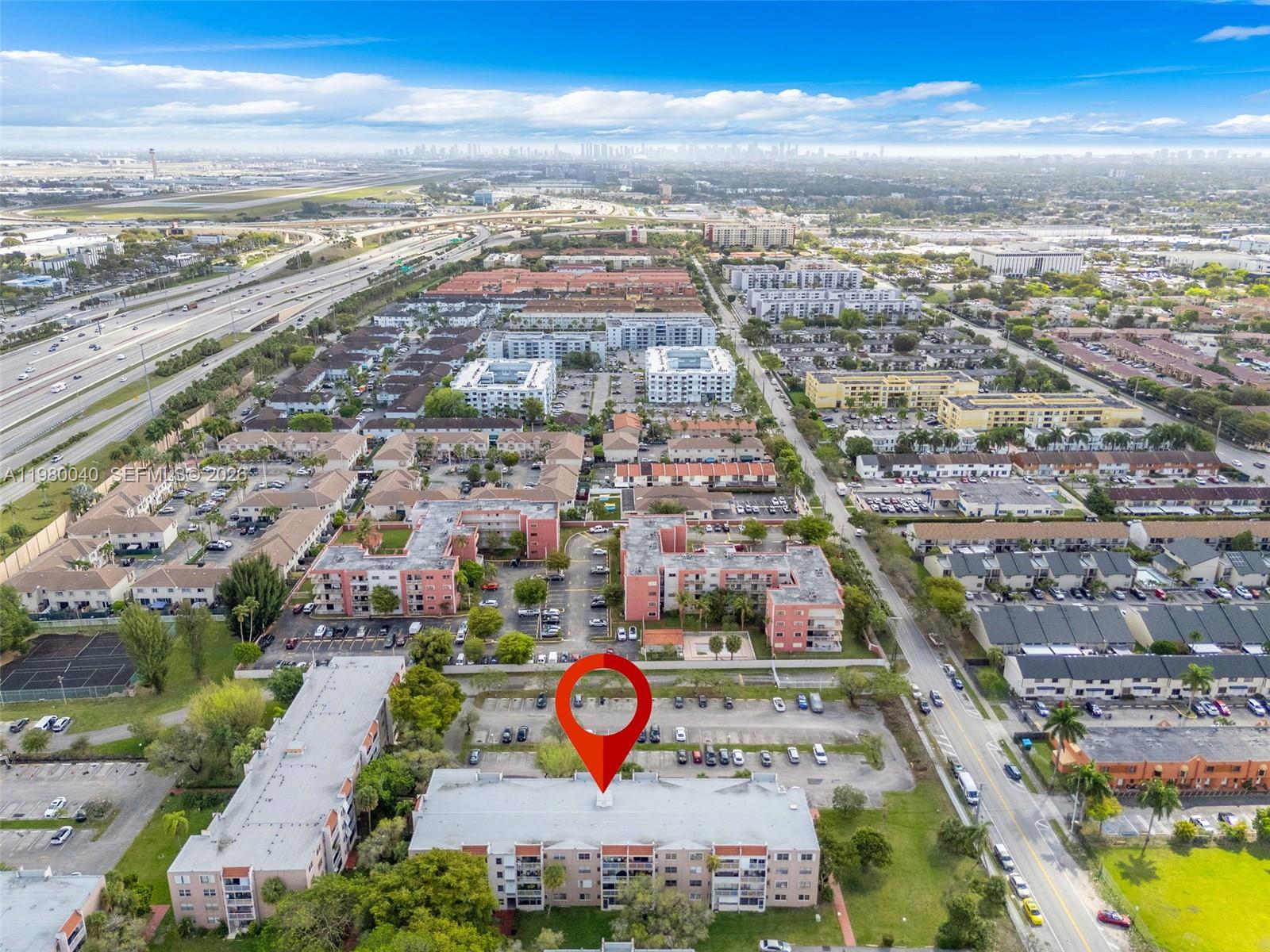 8405 Northwest 8th Street, Unit 1072 Miami, FL 33126 - Photo 9 of 33 an aerial view of residential houses with outdoor space