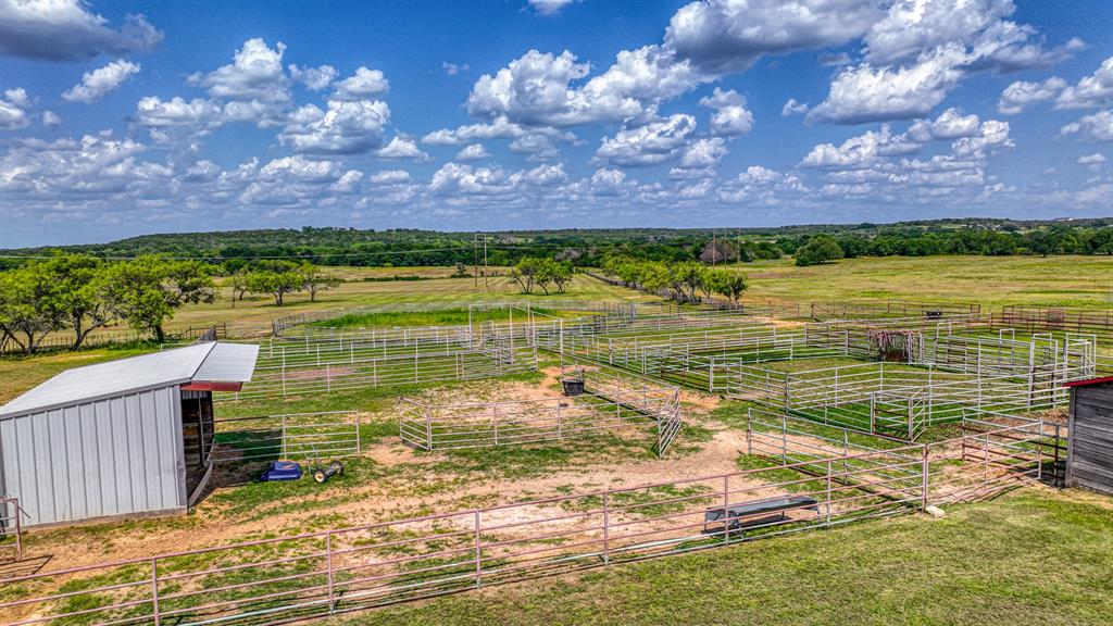 8601 Star Hollow Road Lipan, TX 76462 - Photo 26 of 40 a view of a lake from a yard