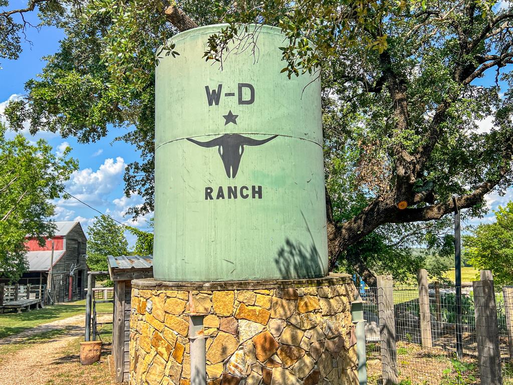 8601 Star Hollow Road Lipan, TX 76462 - Photo 29 of 40 a sign on the side of a building