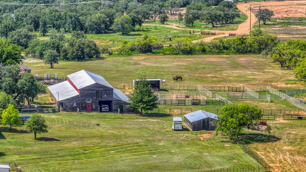 8601 Star Hollow Road Lipan, TX 76462 - Photo 35 of 40 a view of a lake with a yard