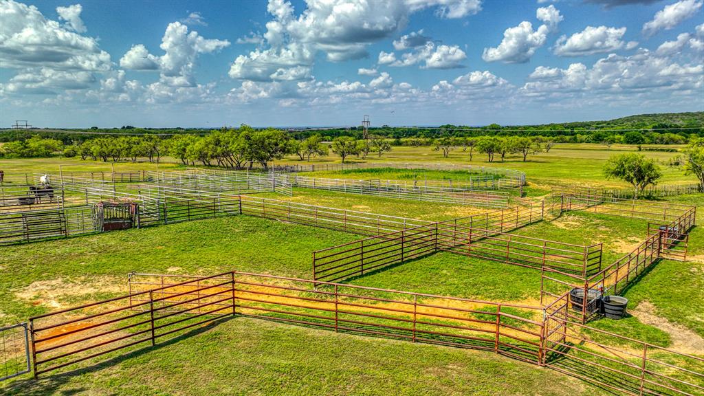 8601 Star Hollow Road Lipan, TX 76462 - Photo 36 of 40 a view of an swimming pool and a yard