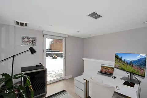 a room with furniture and a window