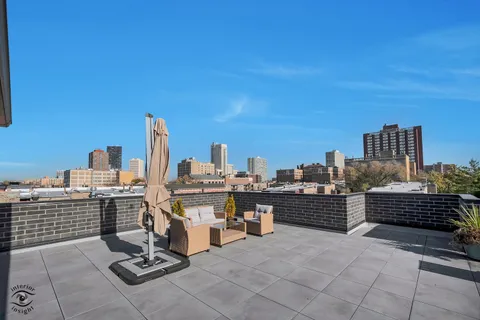 a view of a terrace with chairs