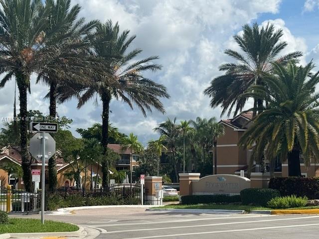a view of a yard and car park
