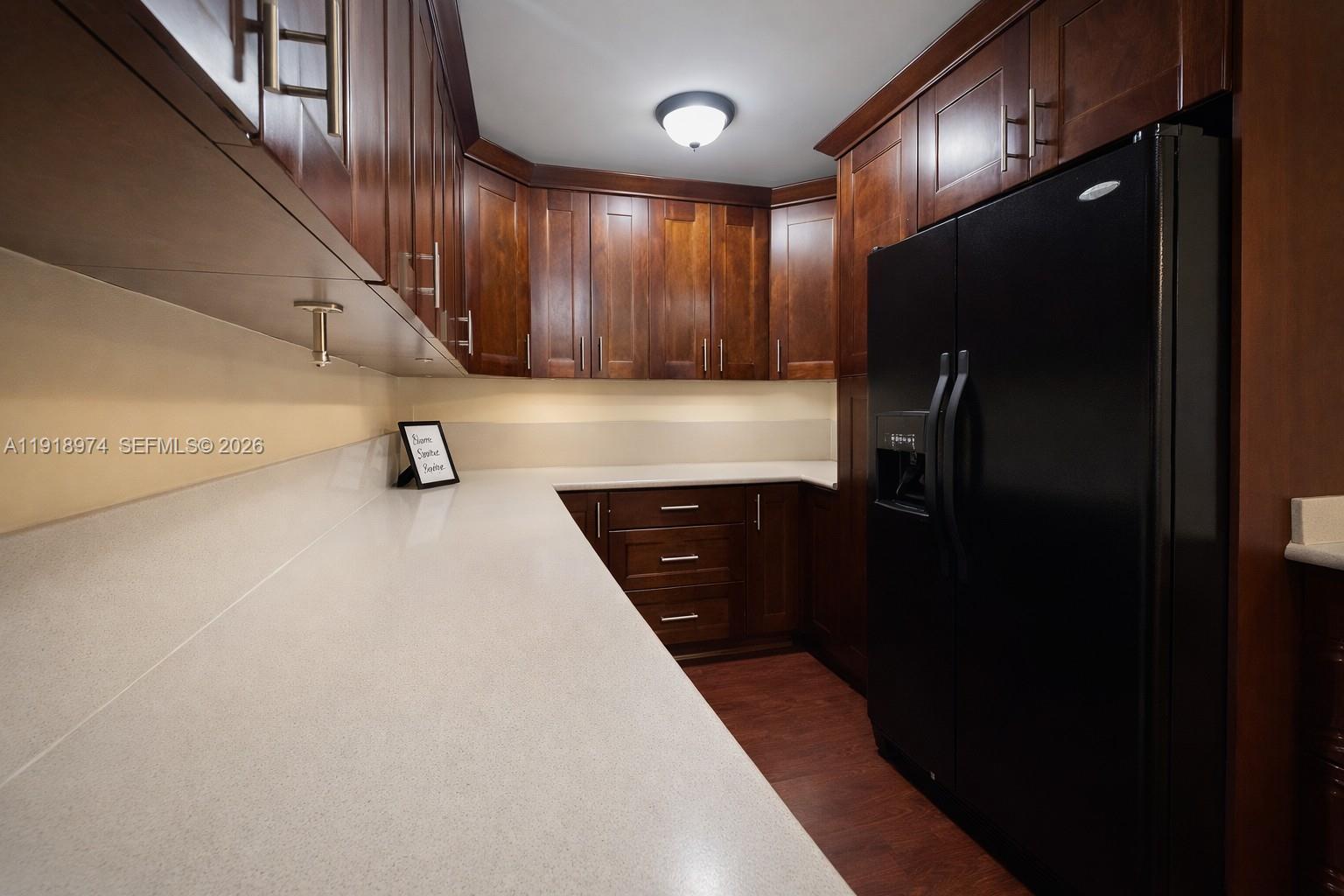 8801 Wiles Road, Unit 307 Coral Springs, FL 33067 - Photo 3 of 16 a view of a hallway with entryway