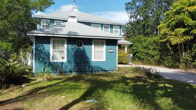 a kitchen with stainless steel appliances a refrigerator and a stove