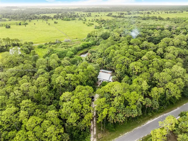 a view of a lake with a house