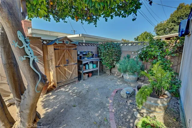 a bedroom with a bed and a mirror