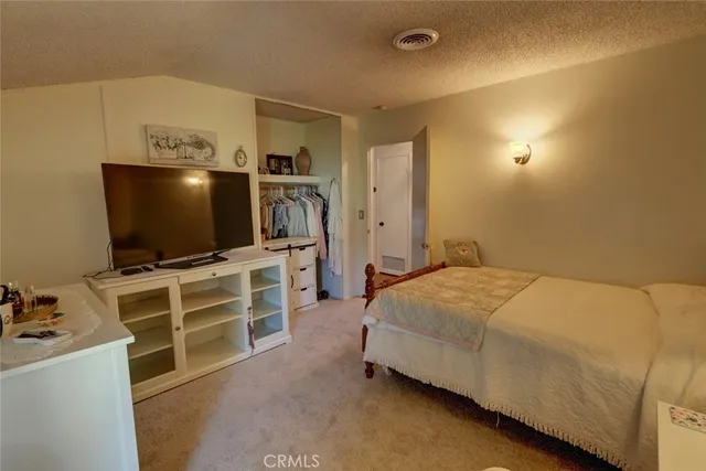 a bathroom with a sink mirror toilet and bathtub