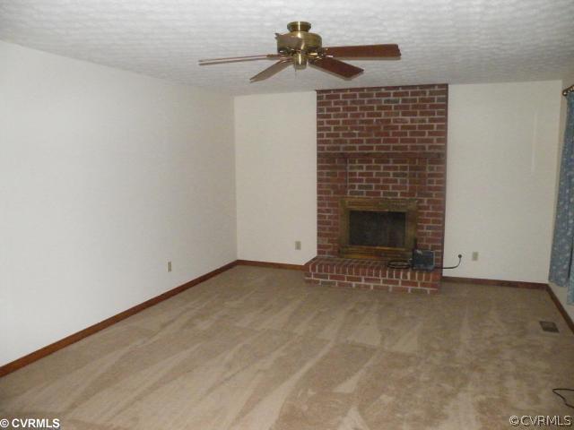 2610 Turner Road Goochland, VA 23063 - Photo 4 of 6 Living Room - Warm Family room with brick Fireplac