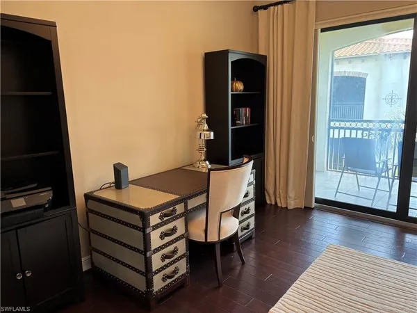 a room with furniture and wooden floor