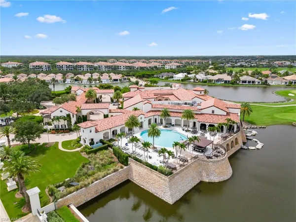 a view of a swimming pool with a patio