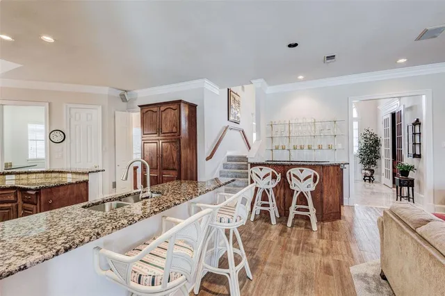 a very nice looking kitchen with a large window
