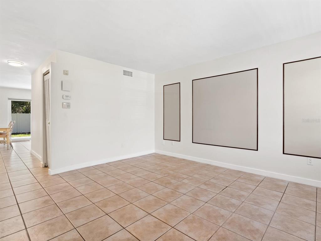 4805 Rilma Avenue, Unit 107 Sarasota, FL 34234 - Photo 3 of 42 a view of an empty room