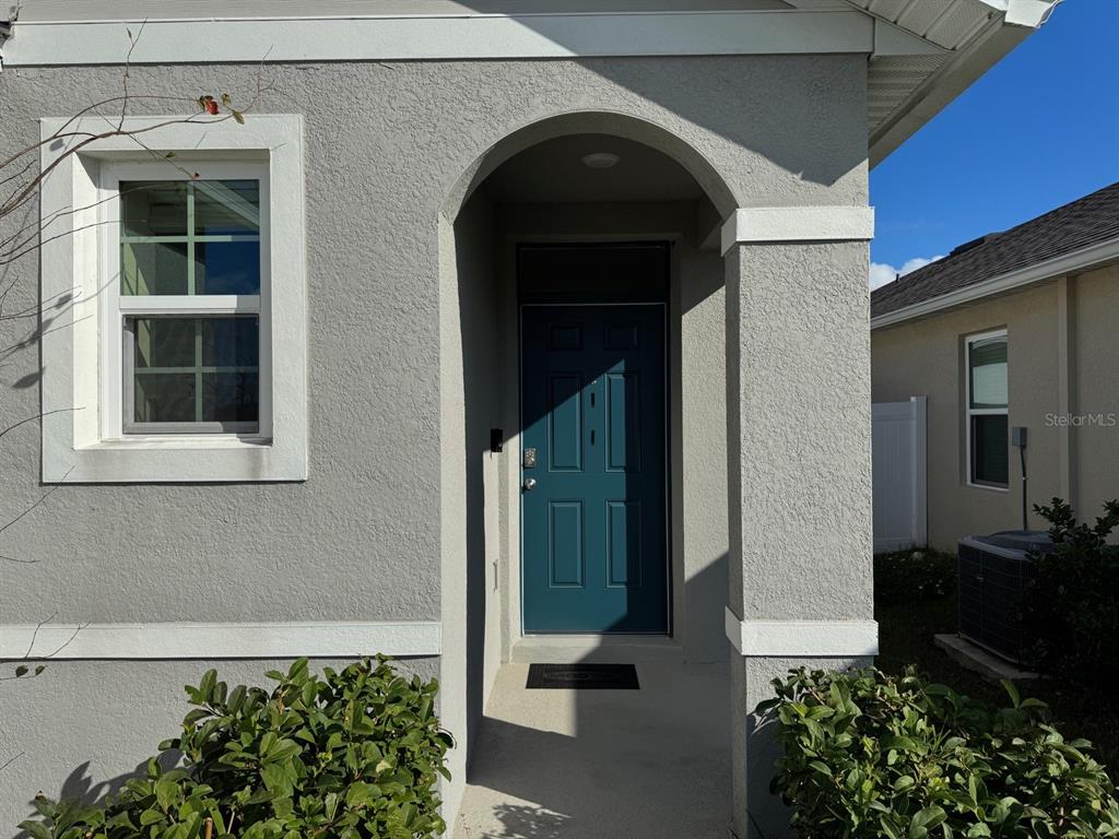 2843 Turnstone Run Harmony, FL 34773 - Photo 1 of 39 a front view of a house with a yard