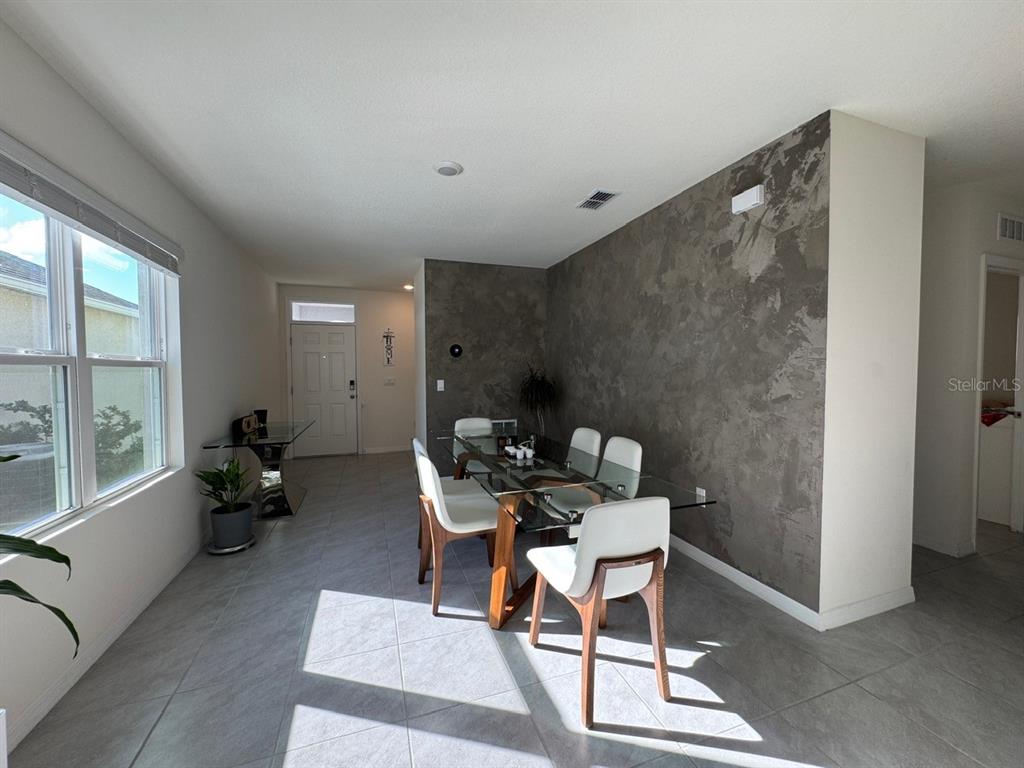 2843 Turnstone Run Harmony, FL 34773 - Photo 20 of 39 a work room with furniture and a large window