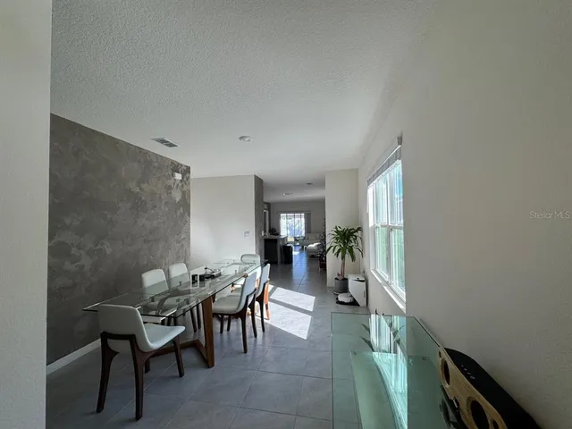 a view of a livingroom and dining room