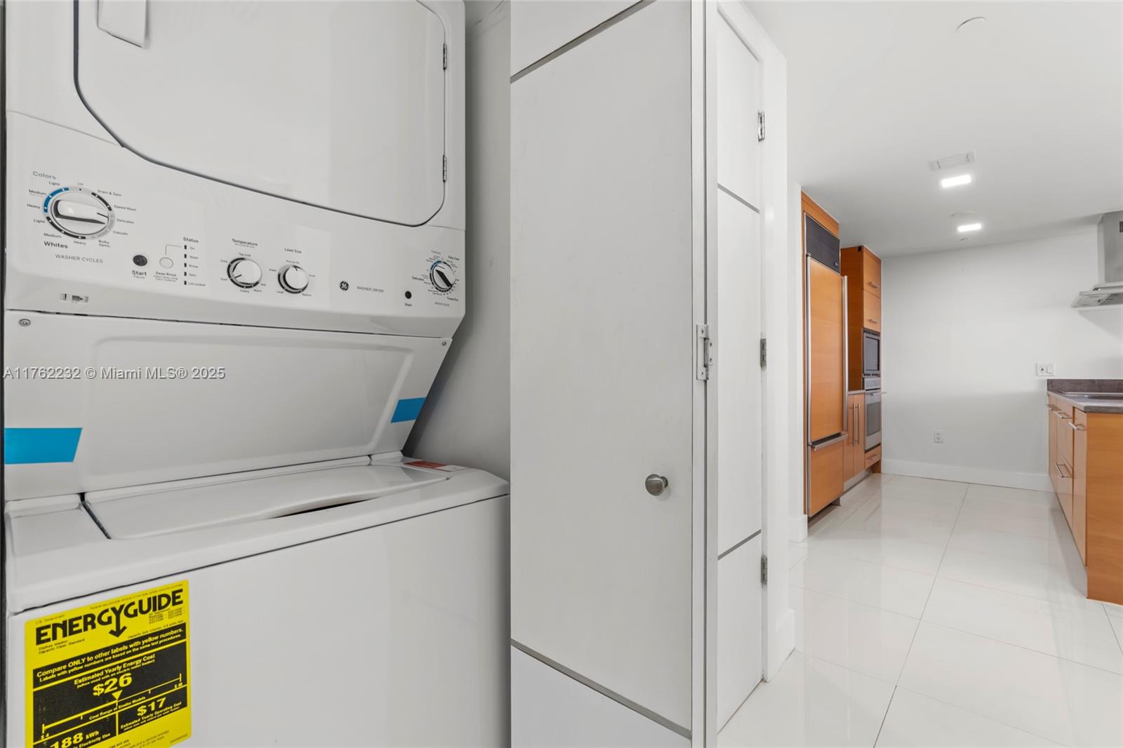 495 Brickell Avenue, Unit 4907 Miami, FL 33131 - Photo 29 of 65 a utility room with dryer and washer