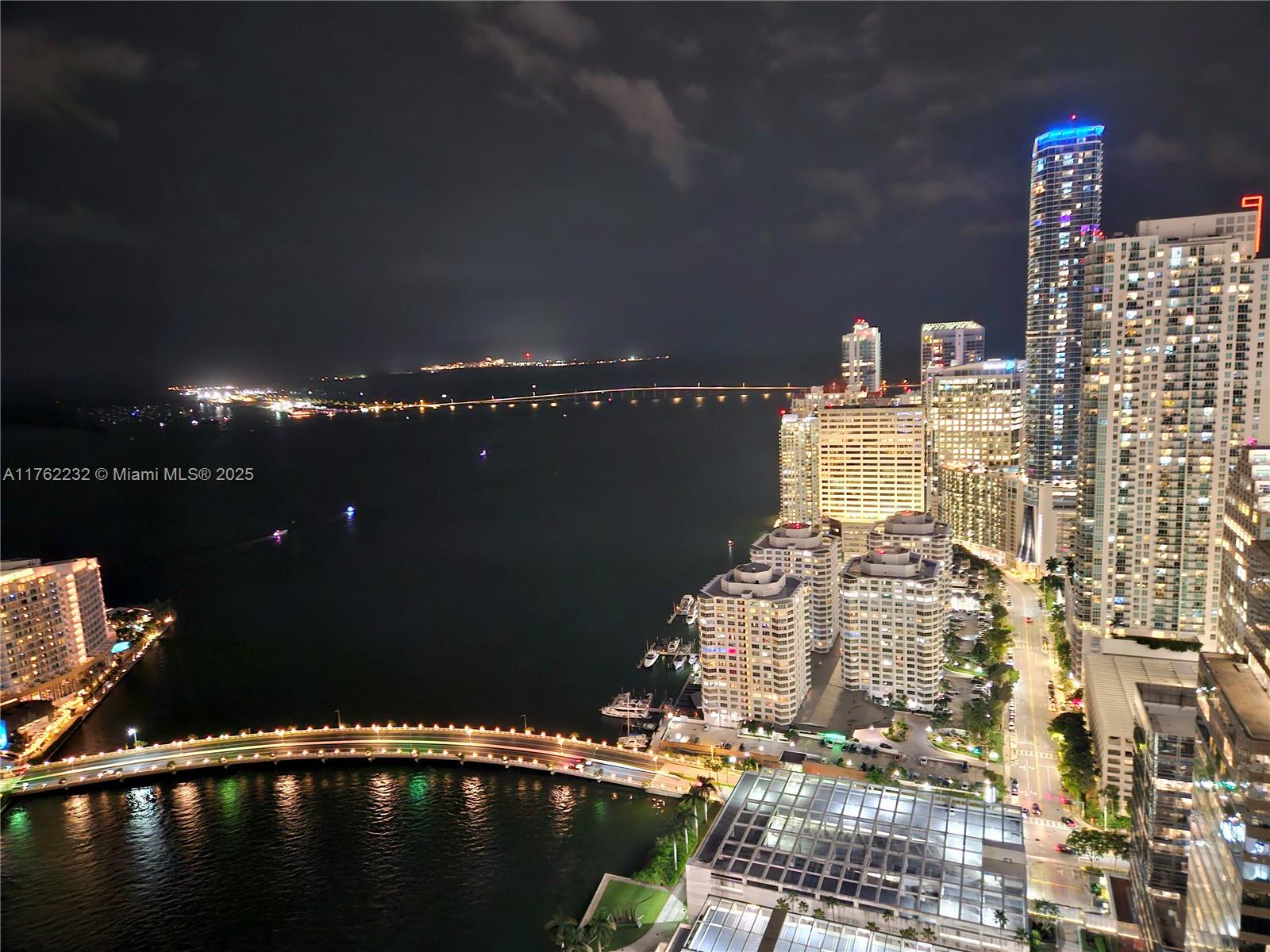495 Brickell Avenue, Unit 4907 Miami, FL 33131 - Photo 35 of 65 a view of swimming pool with outdoor seating