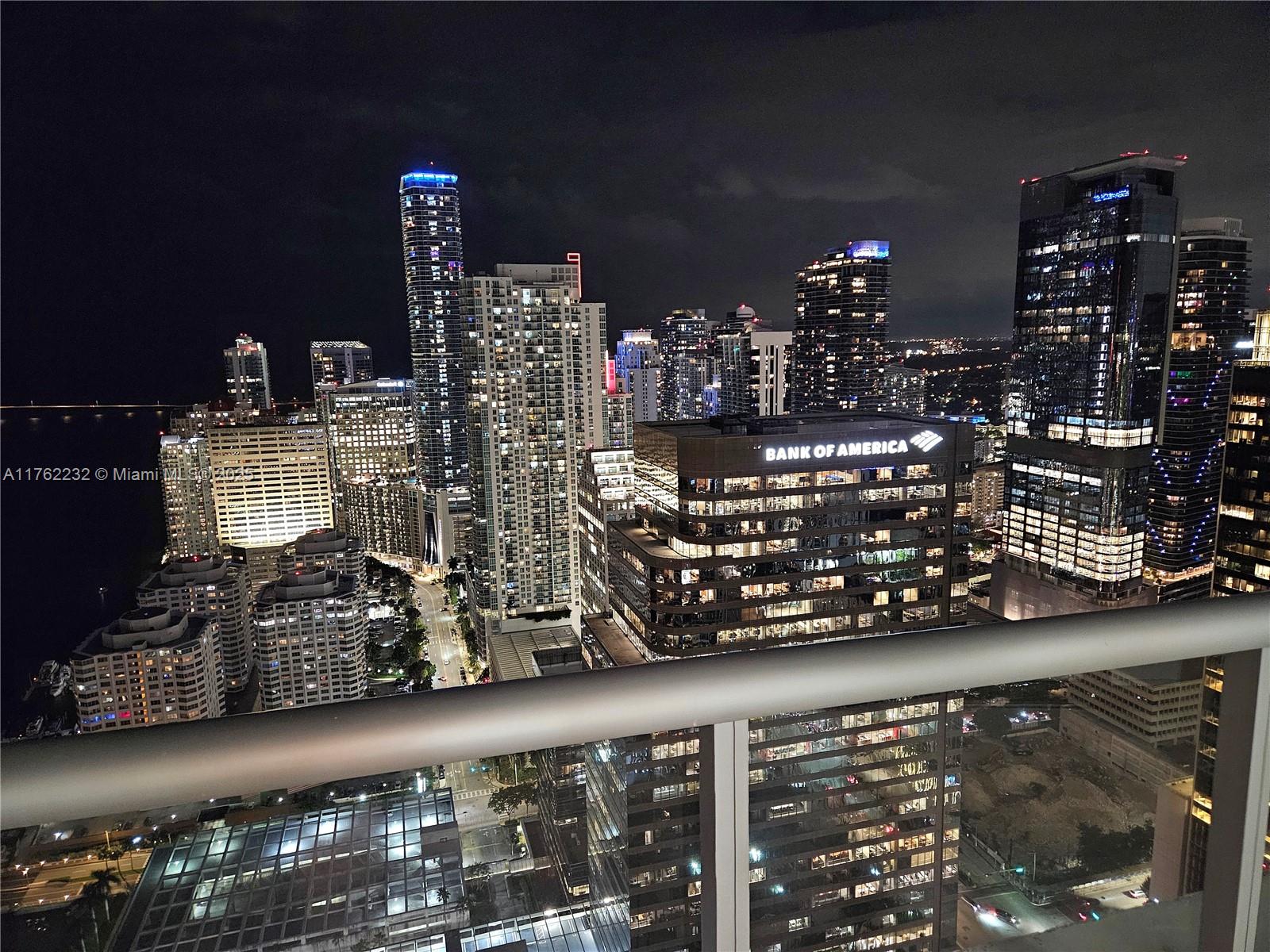 495 Brickell Avenue, Unit 4907 Miami, FL 33131 - Photo 38 of 65 a bunch of bottles sitting on a table