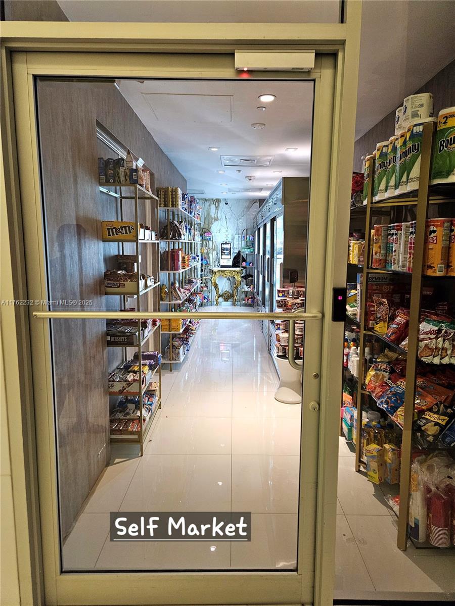 495 Brickell Avenue, Unit 4907 Miami, FL 33131 - Photo 50 of 65 a view of a hallway with dining area