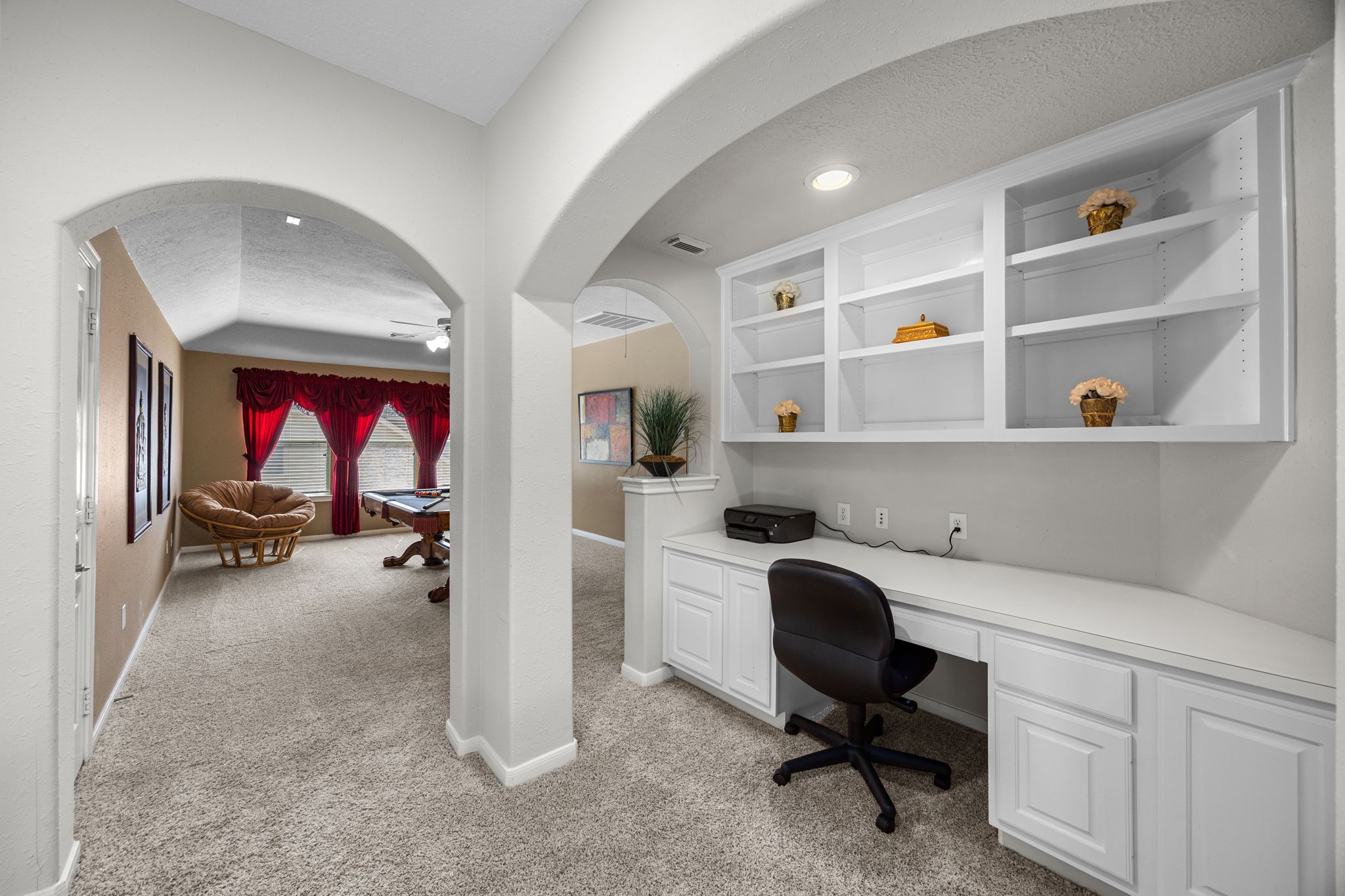 4402 Eden Point Lane Katy, TX 77494 - Photo 26 of 43 a view of a workspace with a window and shelf
