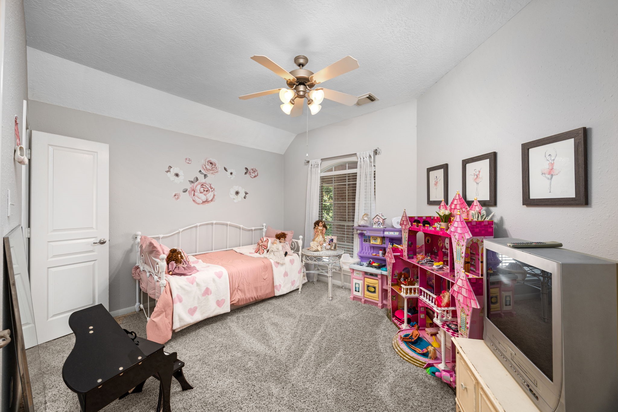 4402 Eden Point Lane Katy, TX 77494 - Photo 27 of 43 a bedroom with furniture and a chandelier fan