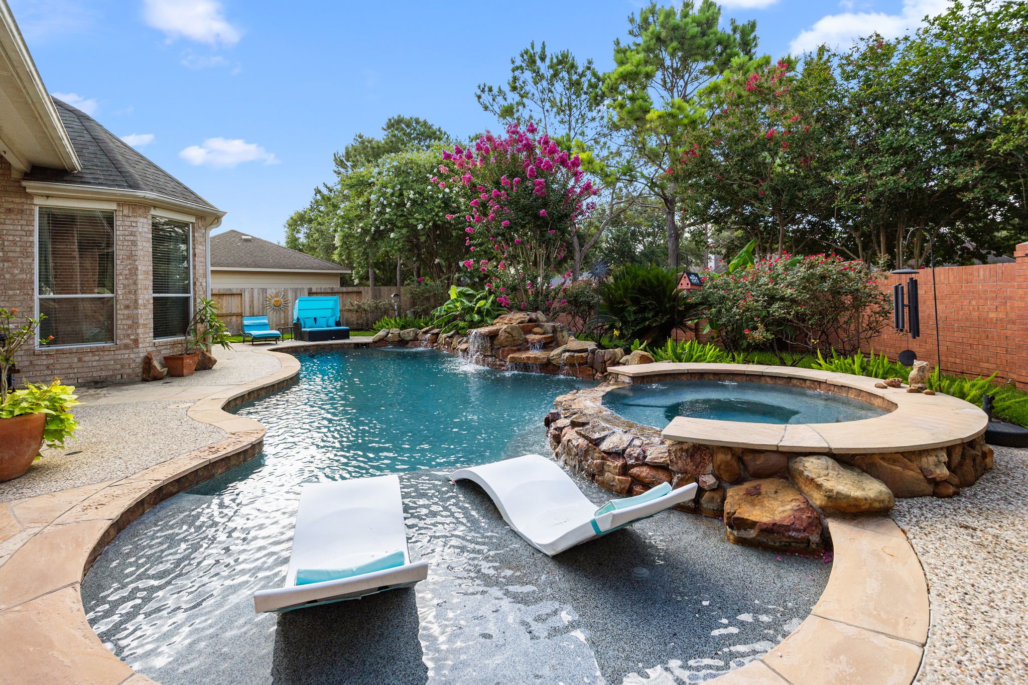 4402 Eden Point Lane Katy, TX 77494 - Photo 38 of 43 a view of a swimming pool with a lounge chair