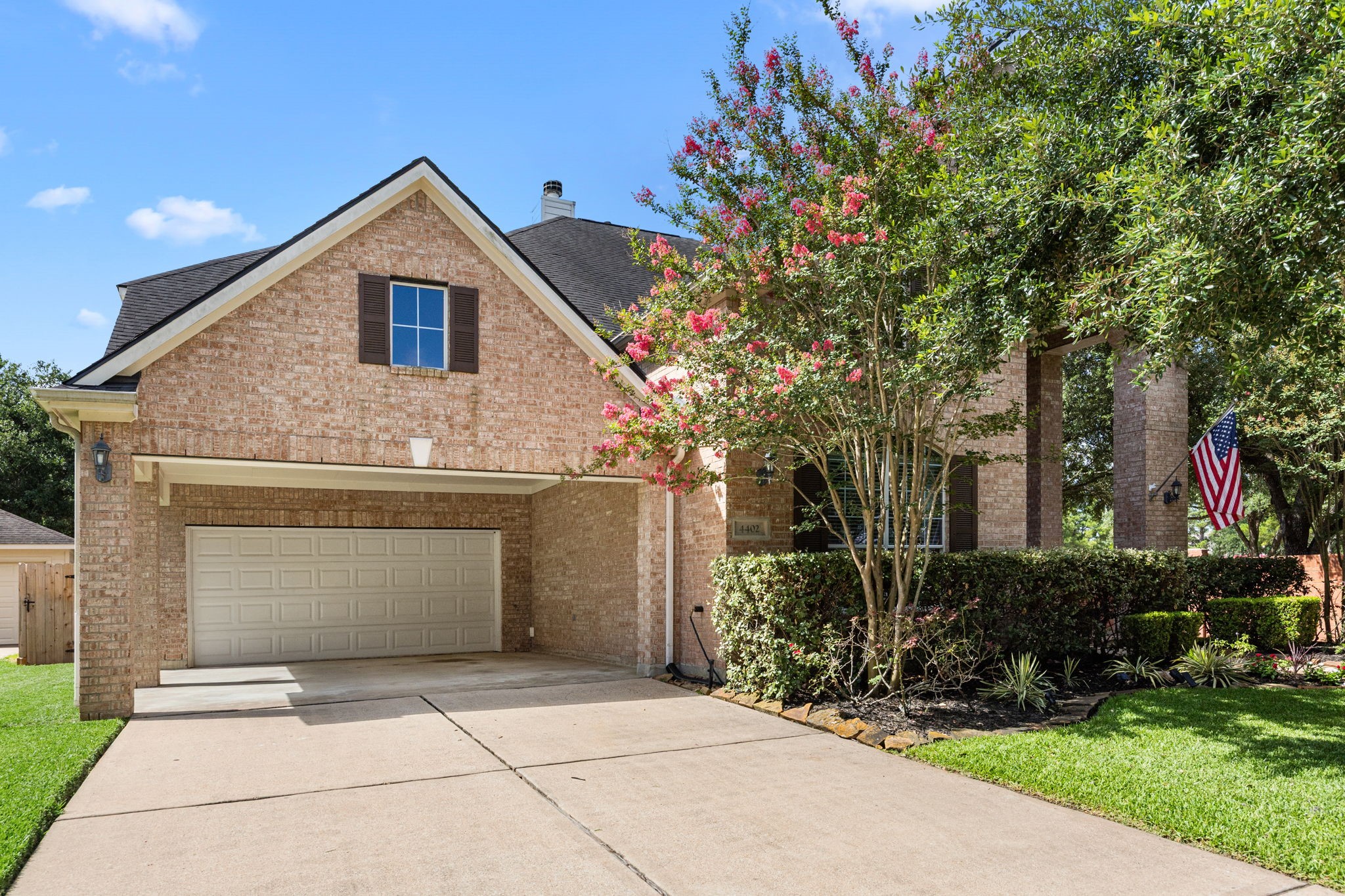 4402 Eden Point Lane Katy, TX 77494 - Photo 6 of 43 a front view of a house with a garden