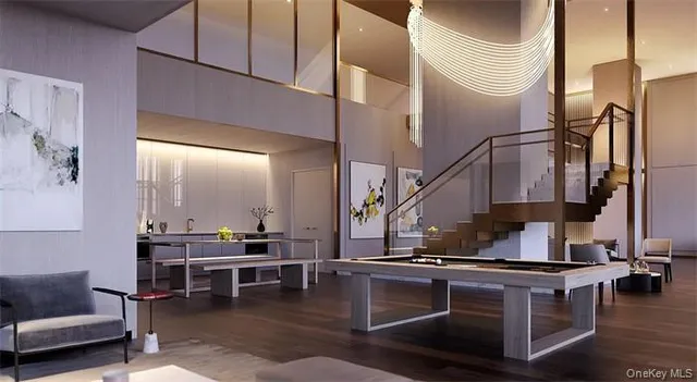 a kitchen with stainless steel appliances kitchen island granite countertop a stove and a sink