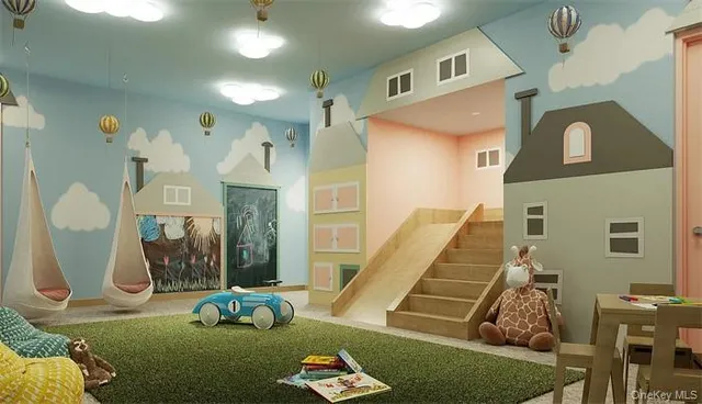 a view of a livingroom with furniture and entryway