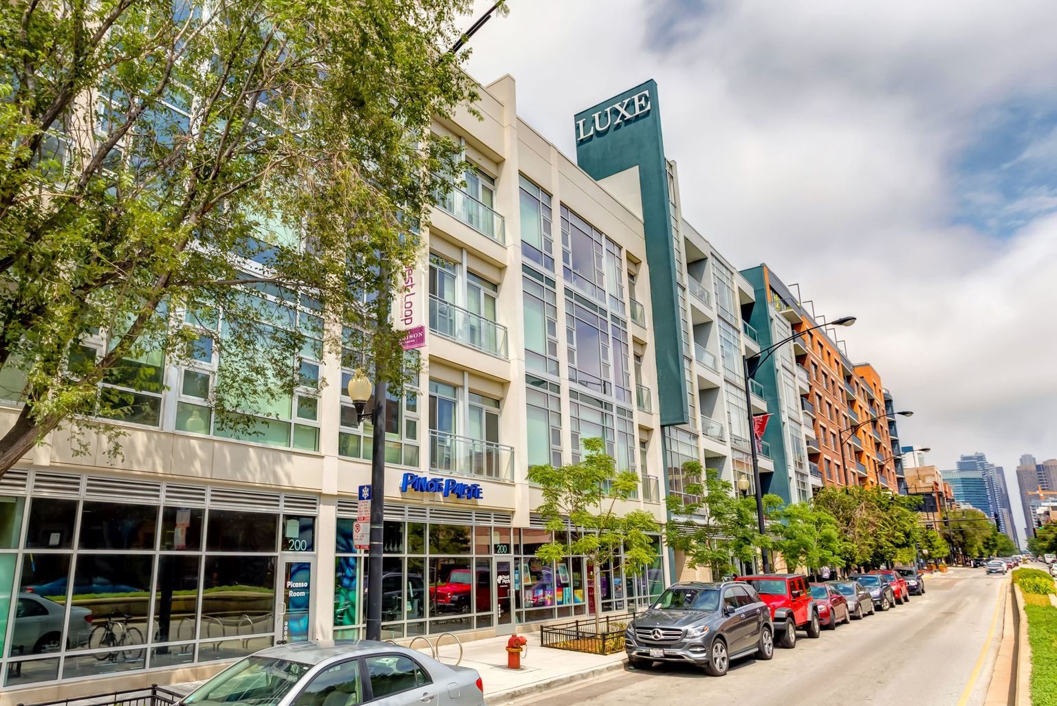 1222 West Madison Street, Unit 501 Chicago, IL 60607 - Photo 1 of 24 a front view of a building with street view