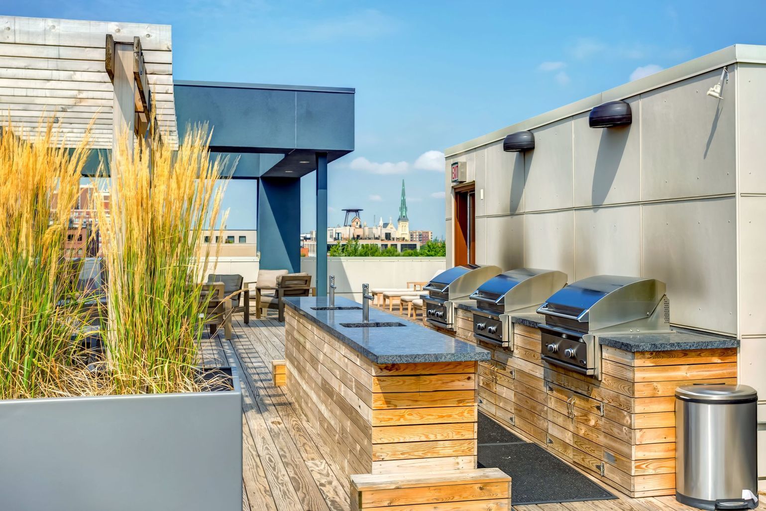 1222 West Madison Street, Unit 501 Chicago, IL 60607 - Photo 12 of 24 a view of a kitchen with furniture and a window