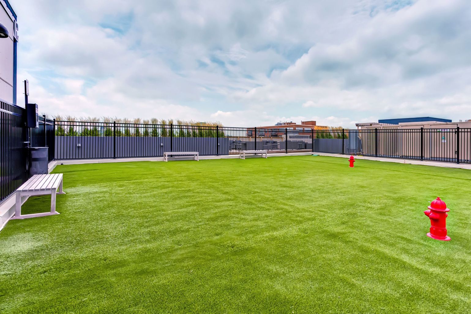 1222 West Madison Street, Unit 501 Chicago, IL 60607 - Photo 16 of 24 a view of a house with a yard and a fountain