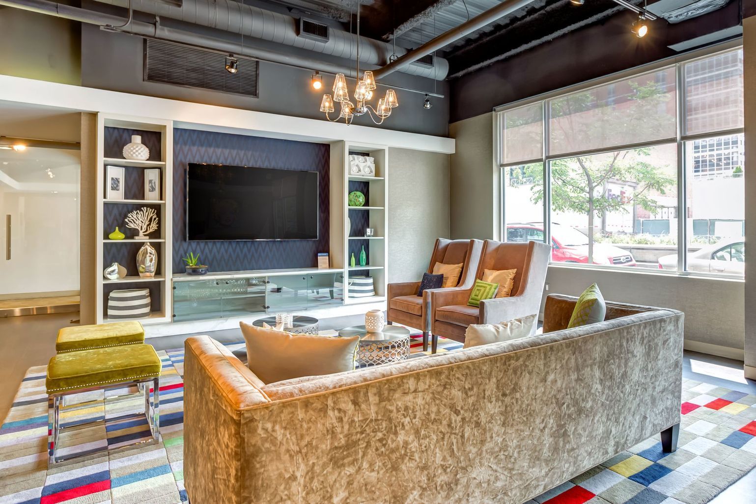 1222 West Madison Street, Unit 501 Chicago, IL 60607 - Photo 19 of 24 a living room with furniture and a flat screen tv
