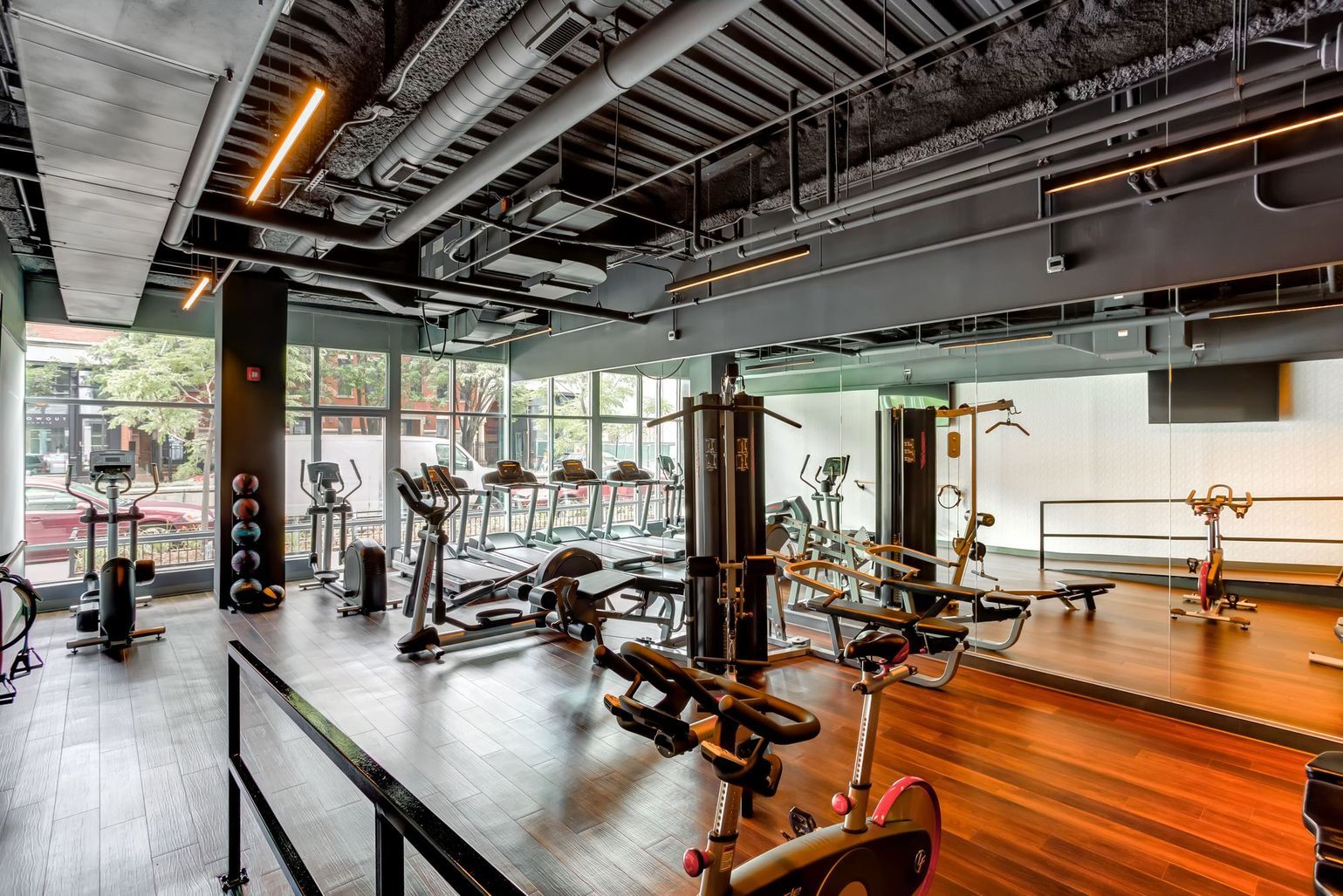 1222 West Madison Street, Unit 501 Chicago, IL 60607 - Photo 23 of 24 a view of a room with gym equipment