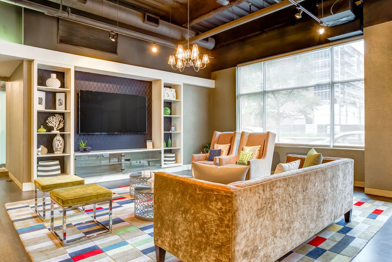 1222 West Madison Street, Unit 501 Chicago, IL 60607 - Photo 4 of 24 a living room with furniture and a flat screen tv