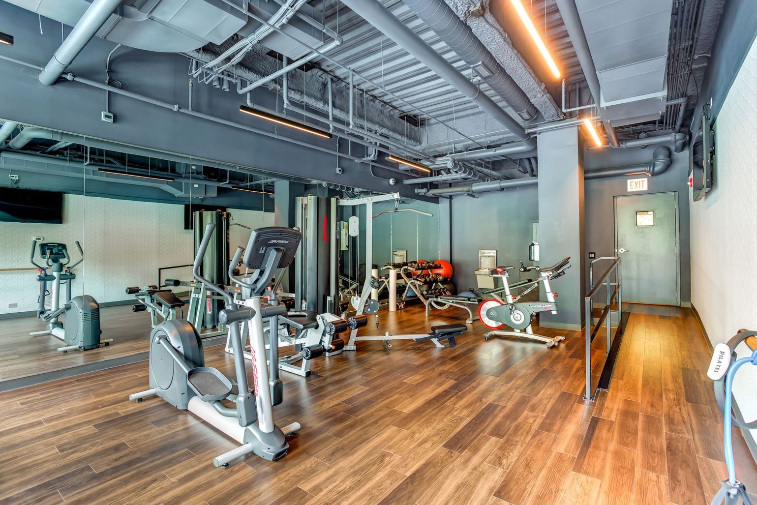1222 West Madison Street, Unit 501 Chicago, IL 60607 - Photo 10 of 24 a view of a room with gym equipment