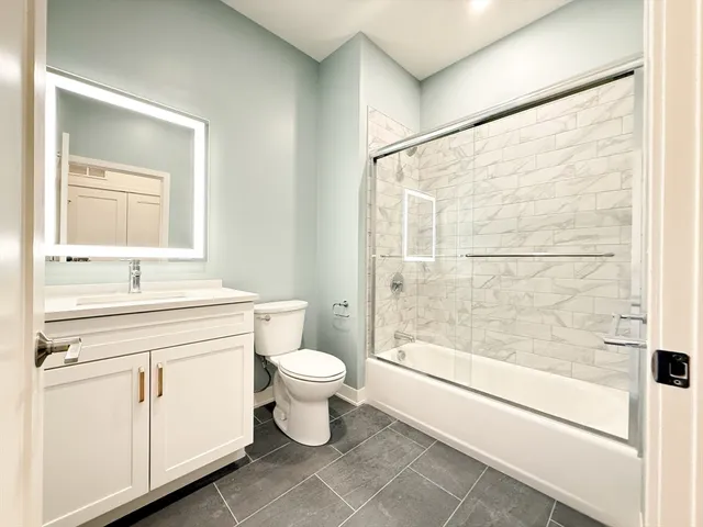 a view of balcony with wooden floor