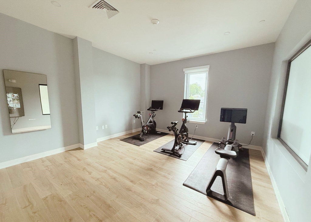 500 Talbot Avenue, Unit 308 Boston, MA 02124 - Photo 21 of 22 a view of a room with gym equipment
