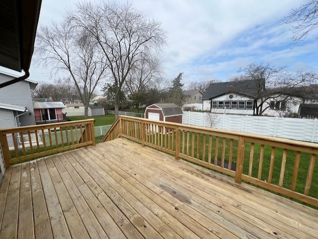 546 Yarmouth Road Elk Grove Village, IL 60007 - Photo 15 of 18 a view of balcony with wooden floor and fence