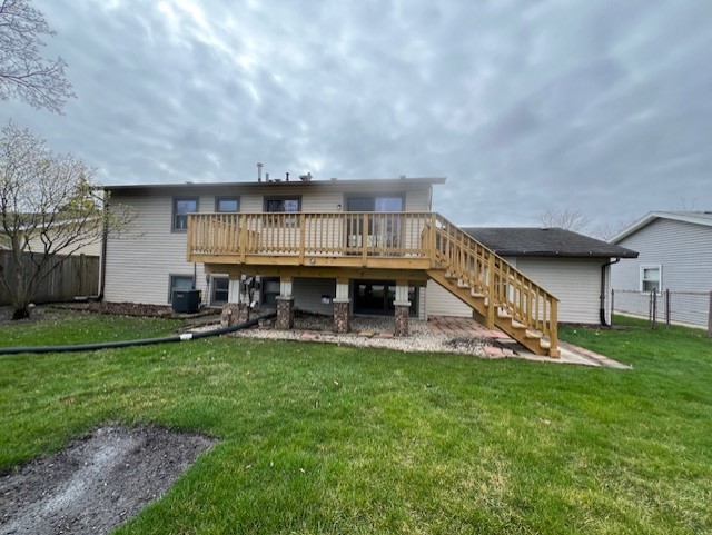 546 Yarmouth Road Elk Grove Village, IL 60007 - Photo 16 of 18 a view of a house with a big yard and a large tree