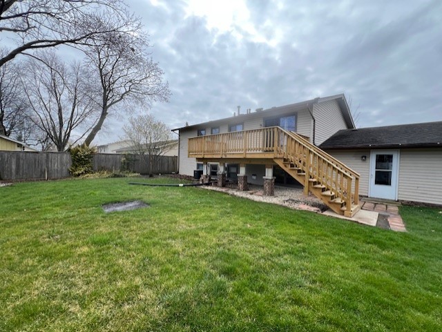 546 Yarmouth Road Elk Grove Village, IL 60007 - Photo 17 of 18 a view of a house with a big yard