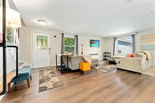 a living room with furniture and a couch