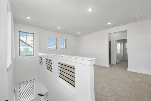a kitchen with a white stove top oven
