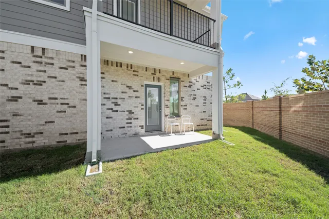 a view of a porch with a yard